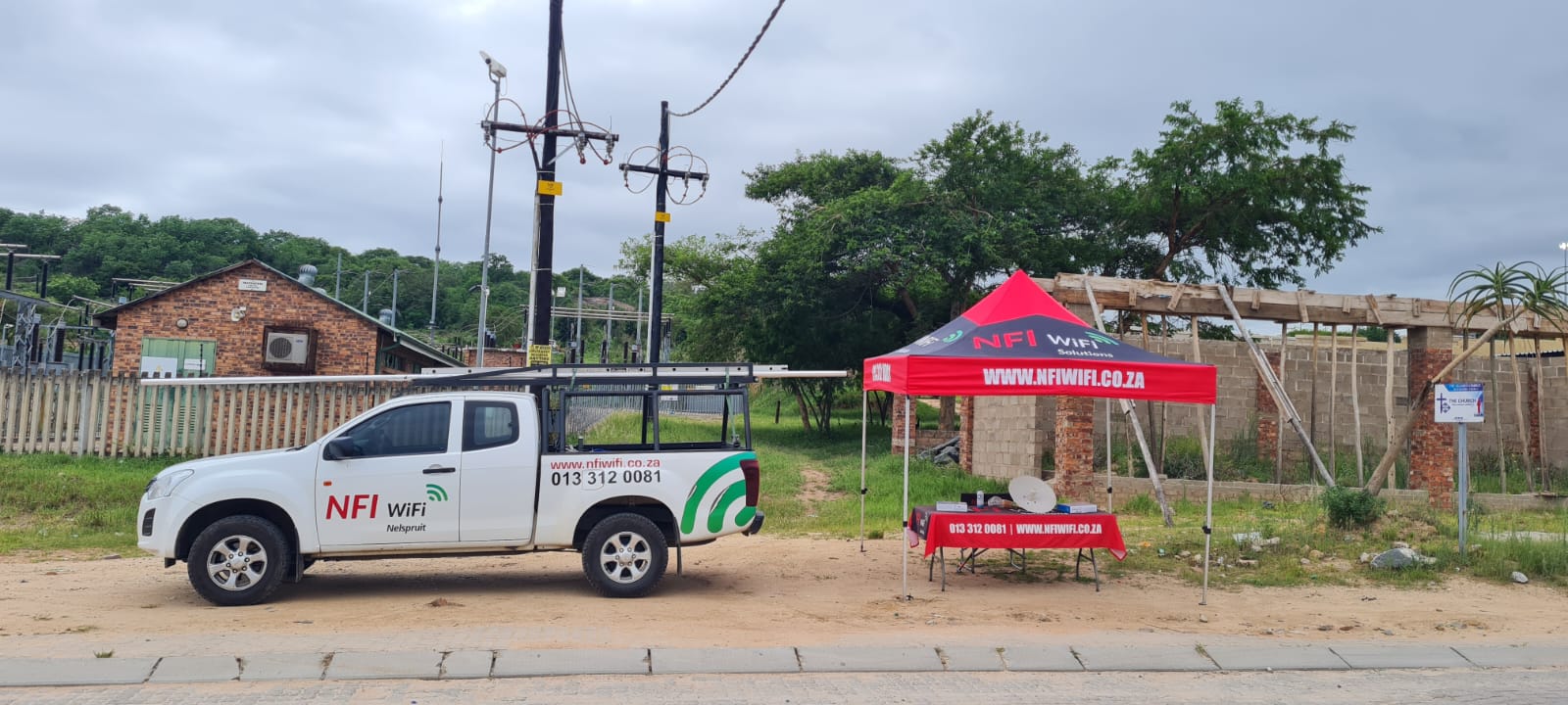 NFI WiFi team and service bakkie at a field installation